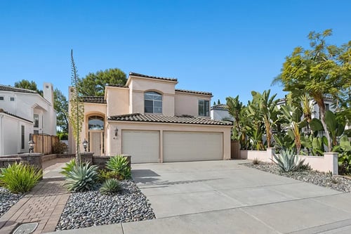 Exterior of women’s residential treatment center home in San Diego with peaceful landscaping and private driveway