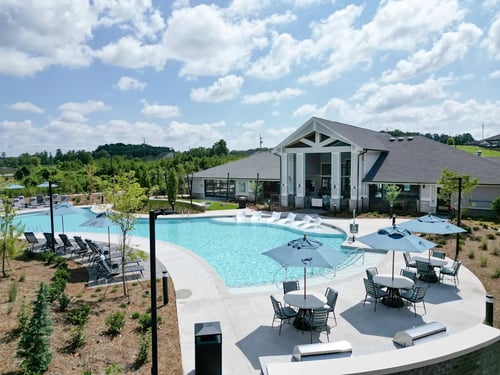Resort-style swimming pool at The Crest at Oakwood Apartments in Oakwood, GA