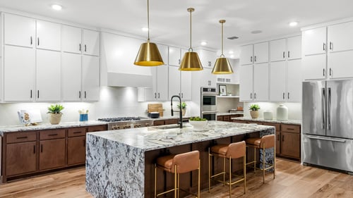 Well-equipped kitchens with ample countertop and cabinet space and large center islands
