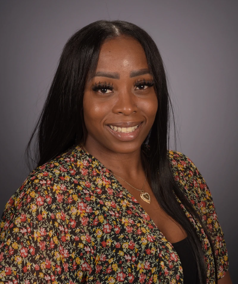 Headshot of School Director Alaycia Phillips