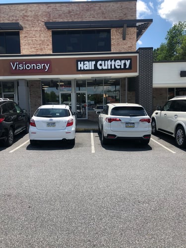 The front entrance of Hair Cuttery at Newtown Square.