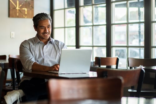 Man using Wi-Fi at a restaurant