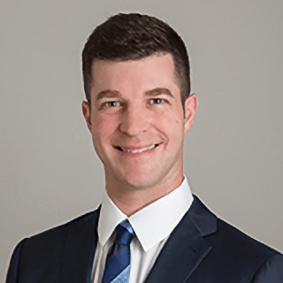 Headshot of Adam Grosvenor