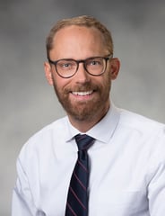 professional portrait of Jordan Blessing, MD