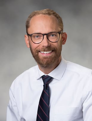 professional portrait of Jordan Blessing, MD