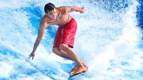 Man riding the FlowRider at The Scene Pool Deck at Planet Hollywood. Rooftop pools, Las Vegas Strip views - what more could you really ask for? Planet Hollywood features the ultimate Las Vegas poolside social retreat at The Scene Pool Deck. Capture your incredible Vegas Pool Instagram moment in a cabana or as you hang ten on the Strip’s only professional free-standing wave, the FlowRider.