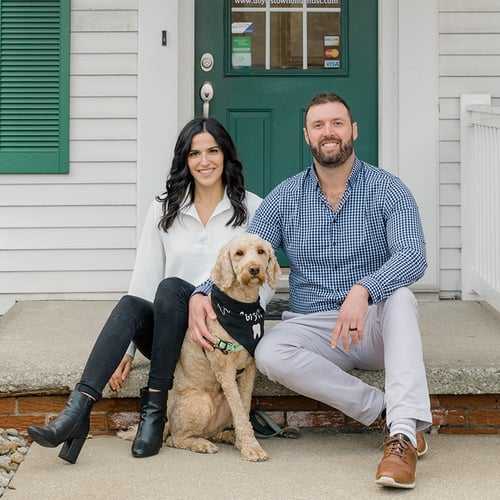 Dr. Daher and Dr. Steinhilber with their dog