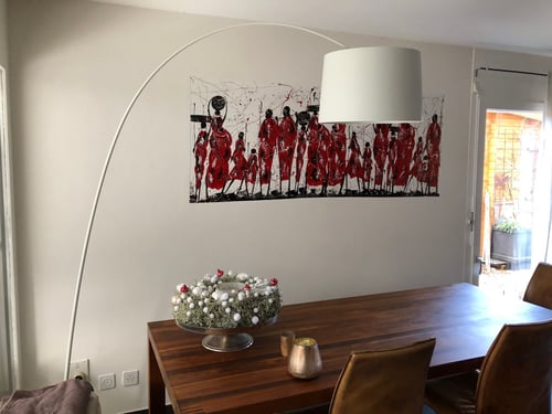 Bild auf Wand aufgezogen und mit Lehmdeckputz restliche Fläche geglättet.