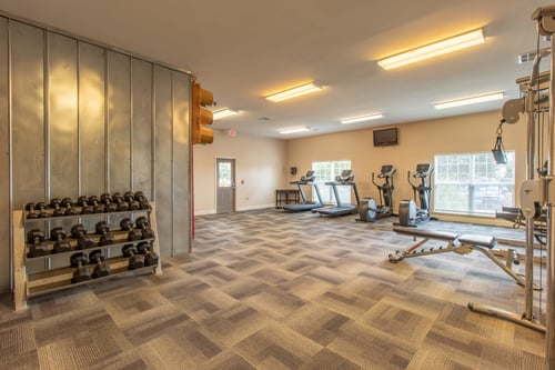 State of the art fitness center with new equipment and treadmills