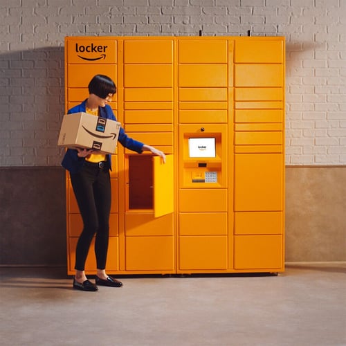 A lady opening an amazon locker