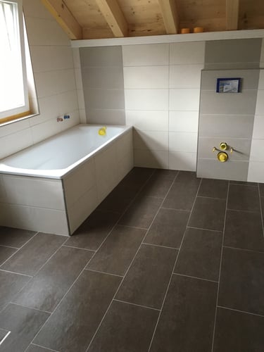 Réalisation salle de bain avec pose de carrelage