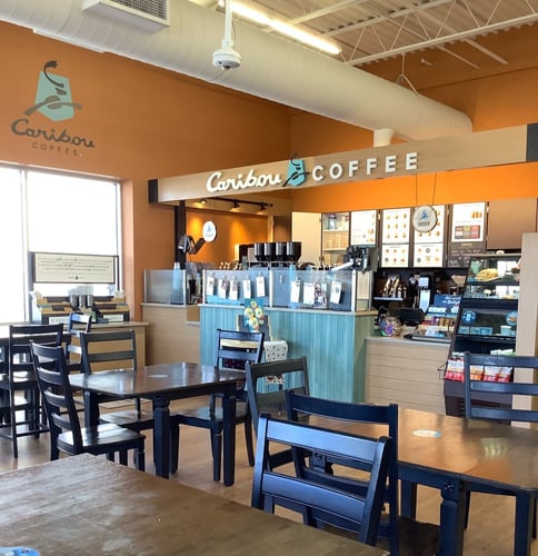 Storefront of the Caribou Coffee at 112 Chieftain Street in Osceola
