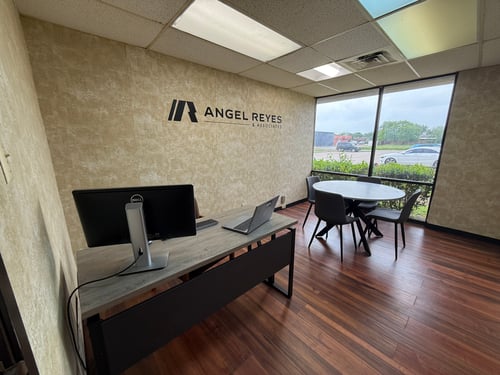 Interior of Mesquite, TX law office for car and truck accident attorneys with reception desk and client seating area.