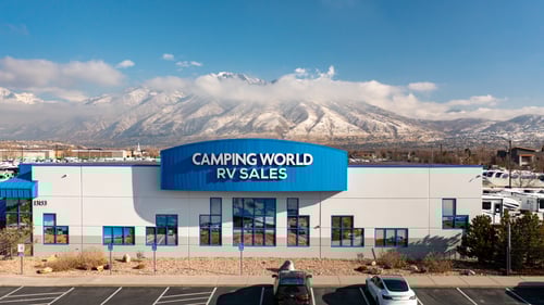 Camping World in Draper, UT storefront with majestic mountain in the background
