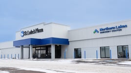 St. Luke's Plaza building with the Northern Lakes Surgery Center logo, showing that the location is within the building.