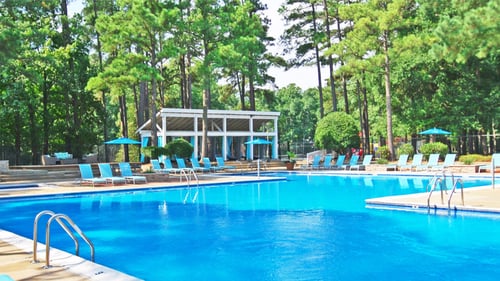 Cabanas overlooking the main pool at St. John's Wood Apartments