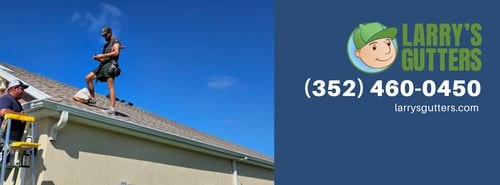 Man installing gutters on a roof under a blue sky, with a person on a ladder assisting. Larry's Gutters logo and contact info on the right side.