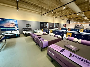 Purple mattresses at Slumberland Furniture Champaign.
