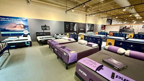 Purple mattresses at Slumberland Furniture Champaign.