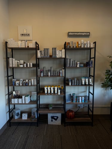 Close-up of two retail shelves stocked with various Dermalogica and IMAGE Skincare products.