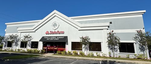 a white building that reads state farm