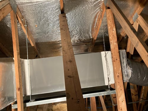 Tuning up furnace unit in the attic