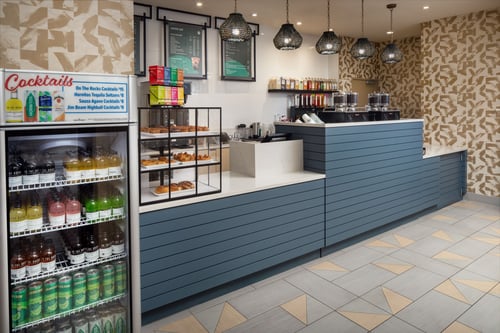 Front counter of Lakeside Cafe displaying drinks and pastries.