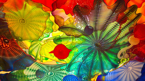 close up of multicolored flowers made of glass