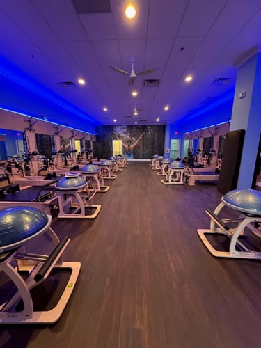 Club Pilates Studio at Whitehouse station showing reformers.