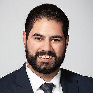 Headshot of Roshan Mann