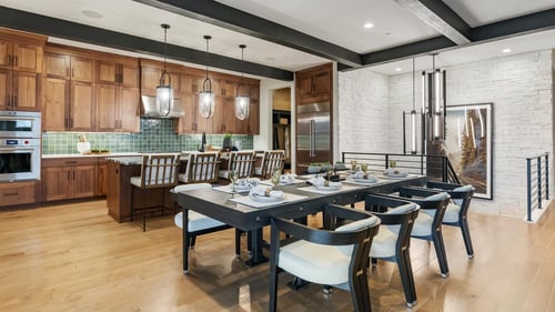 Open kitchen and dining area of the Cushman with Basement home design