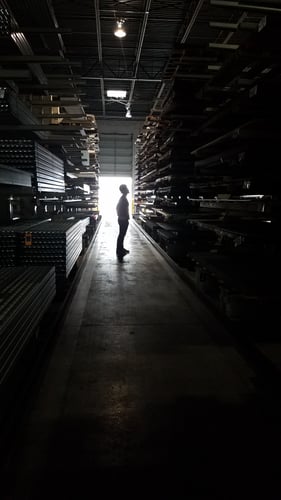 an aisle of specialty metals at McNICHOLS Tampa warehouse