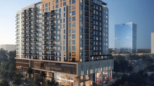 505 courtland high rise apartments with Atlanta skyline behind it