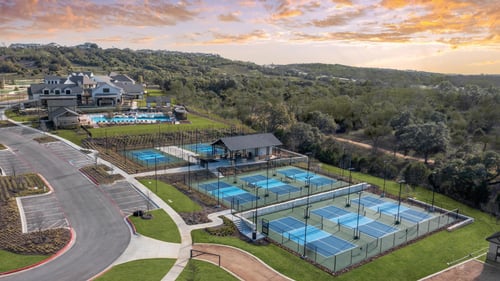 Luxury amenity center exclusively for Regency residents featuring a resort-style pool, 9 pickleball courts, bocce courts, game lounge, and more