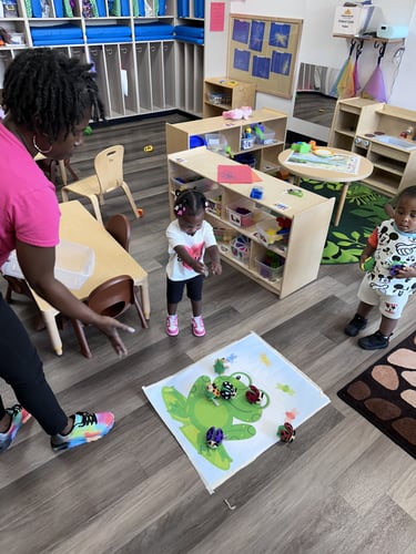 Children playing with colorful, ladybug-shaped toys during playtime.