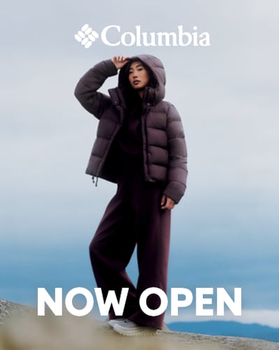 woman standing in puffer jacket