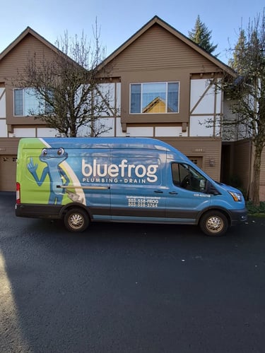 a bluefrog van in front of an outer Southeast Portland Townhouse