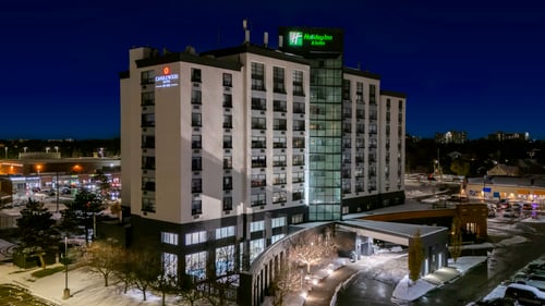 London hotel exterior illuminated at night