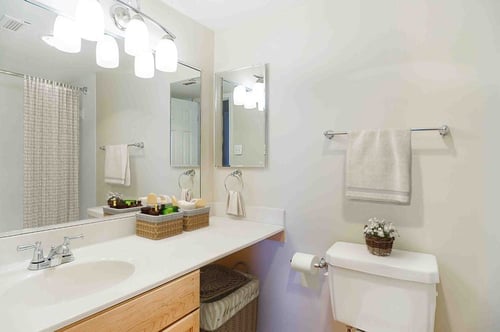 Bathroom with sink and wooden cabinet
