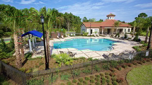 Residents can enjoy lounging poolside at the community amenities