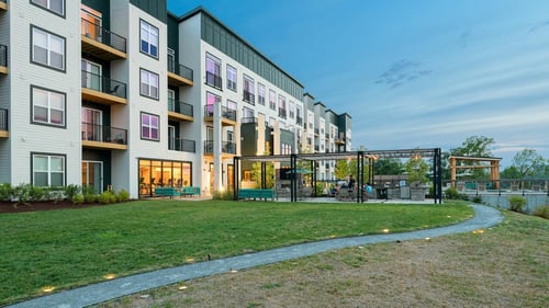 outdoor amenities with bells bluff apartment building in the background