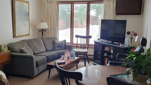 interior photo of an apartment living room space at Duroy Terrace complex