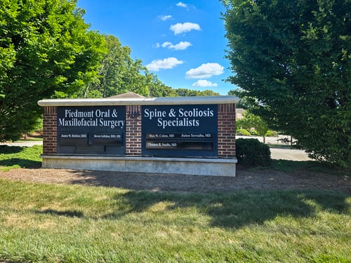 Exterior sign with practice name for Spine & Scoliosis Specialists - Greensboro