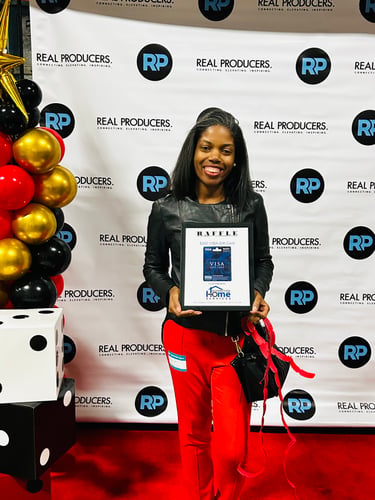 Patrice Henderson, Associate Broker and Founder of Designed Living Real Estate, at a Metro Detroit real estate industry event