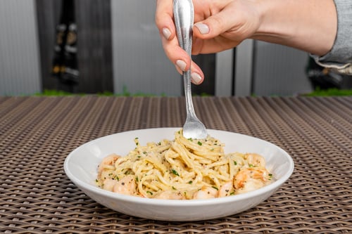 Shrimp Cacio E Pepe being eaten