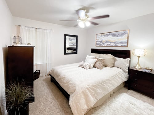 Interior bedroom with white walls and ceiling fan at Greenbriar Apartments, Tulsa, 74136
