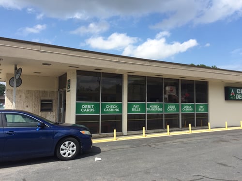Exterior of ACE Cash Express at 1110 East Roosevelt Rd Little Rock AR. offering check cashing and money orders and other financial services.