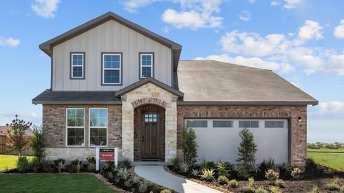 two-story new home with brick exterior
