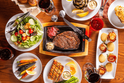 Steak Pit restaurant dishes including steak and seafood at Utah's best mountain-side, ski resort steak house at Snowbird.