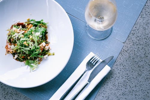 Mix Green Salad with Feta Cheese and a Glass of White Wine